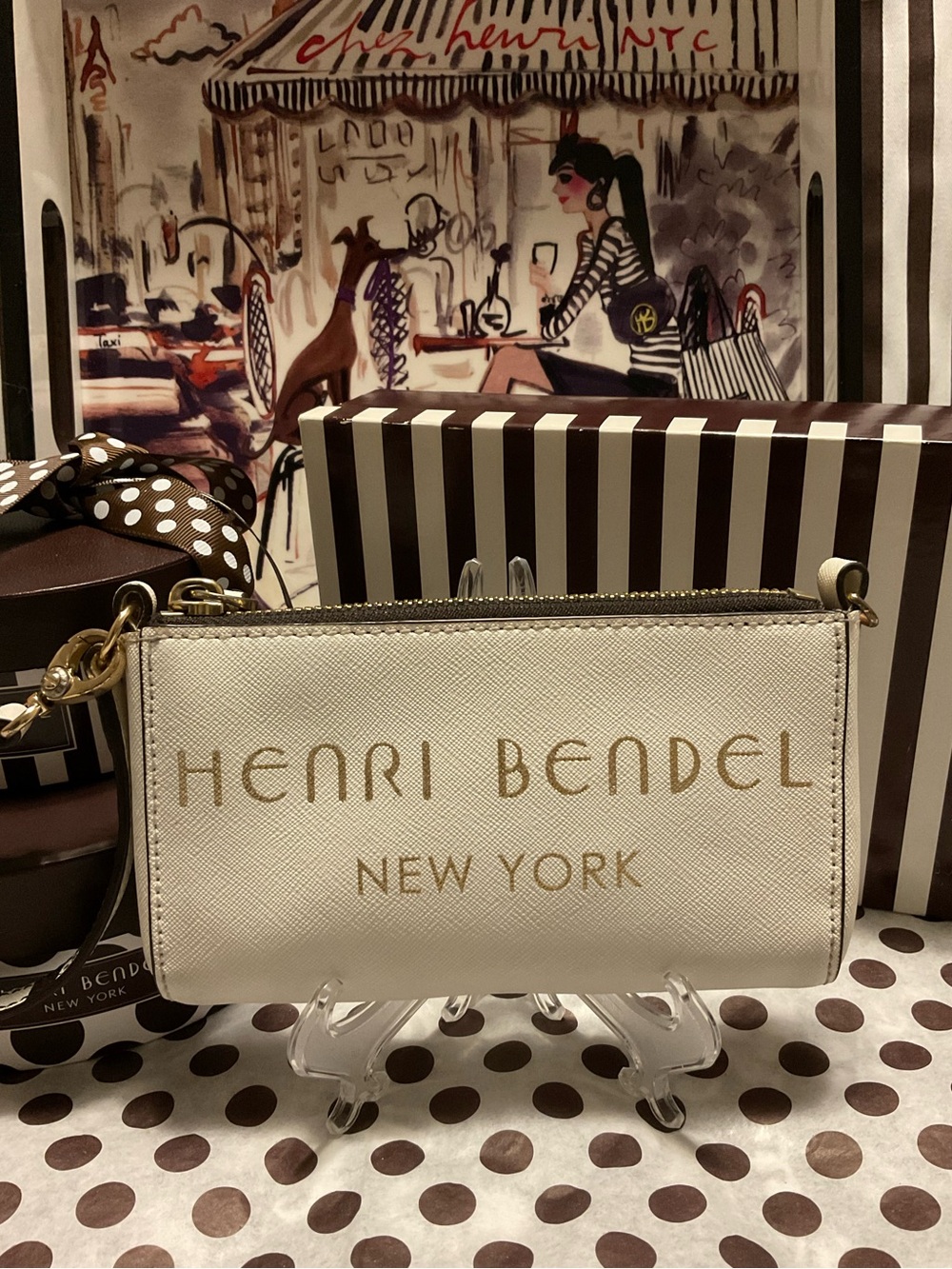 Very Cute and Unique Henri Bendel Wristlet- White with Gold